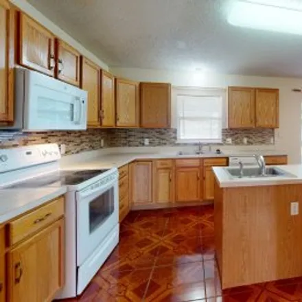 Buy this 4 bed apartment on 5243 Sunset Canyon Drive in Blackstone Landing, Kissimmee