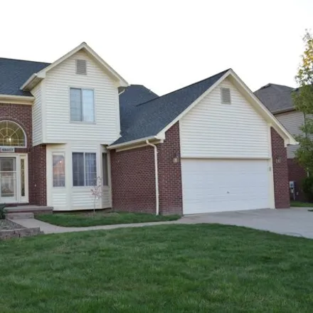 Buy this 5 bed house on 48615 Brittany Parc Drive in Macomb Township, MI 48044