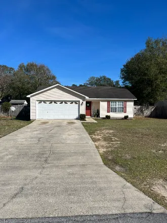 Rent this 3 bed house on 6043 Savannah Dr