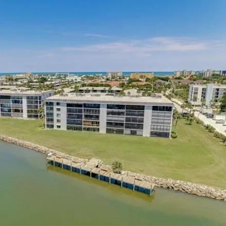 Buy this 2 bed condo on 3677 South Banana River Boulevard in Cocoa Beach, FL 32931