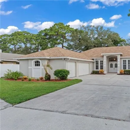Buy this 4 bed house on 1682 Tallahassee Drive in Tarpon Springs, FL 34689