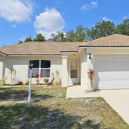 Rent this 3 bed house on 1982 Lansing Street in Melbourne, FL 32935