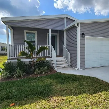 Buy this studio apartment on 5429 Fiddleleaf Drive in Lee County, FL 33905