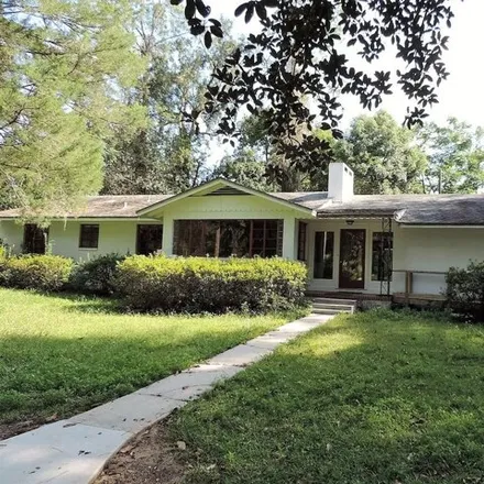 Rent this 4 bed house on 2071 Northwest 9th Avenue in Gainesville, FL 32603