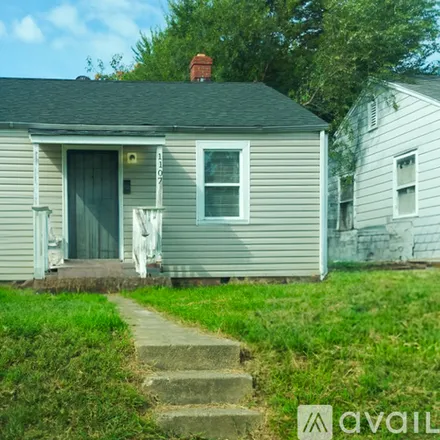 Rent this 2 bed house on 1107 E 15th St