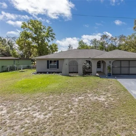 Buy this 3 bed house on 6164 Newmark Street in Spring Hill, FL 34606