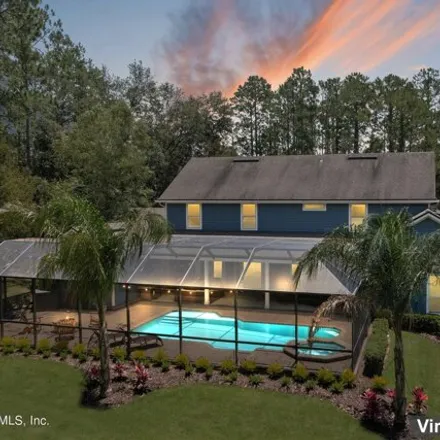 Buy this 6 bed house on Magnolia Point Golf and Country Club in 3570 Clubhouse Drive, Green Cove Springs