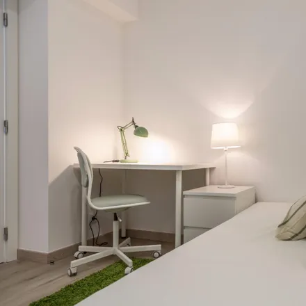 Rent this 3 bed room on Avenida Ressano Garcia 43 in 1070-234 Lisbon, Portugal