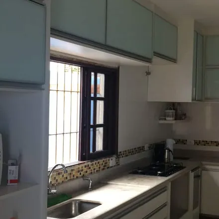 Rent this 4 bed house on Praia Grande