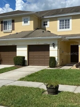 Buy this 3 bed townhouse on 20472 Needletree Drive in Tampa, FL 33645