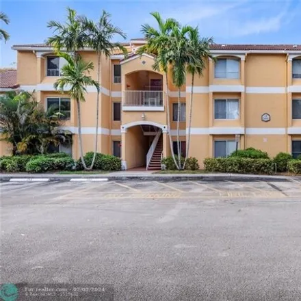Buy this 2 bed condo on 2421 Northwest 33rd Street in Royal Palm Isles, Broward County