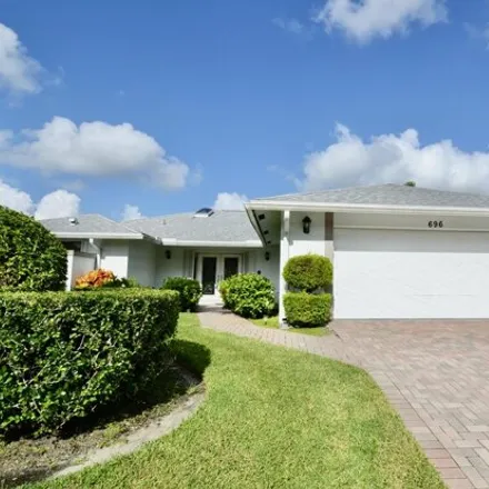 Buy this 3 bed house on 692 Juniper Place in Wellington, FL 33414