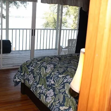 Rent this 4 bed house on Lake Placid in FL, 33852