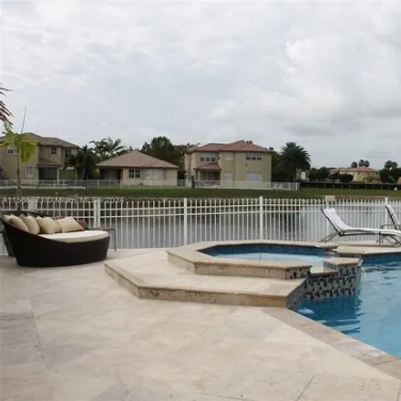 Rent this 4 bed house on 11304 Northwest 79th Lane in Medley, Miami-Dade County