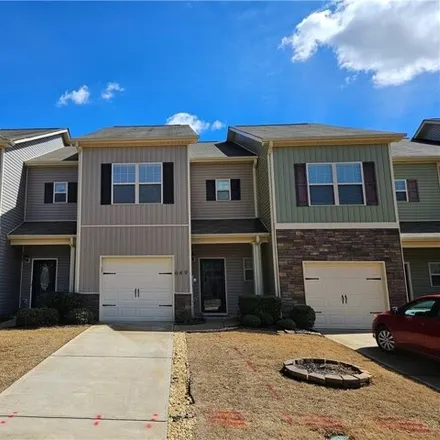Rent this 3 bed townhouse on 699 Oakside Place in Cherokee County, GA 30102