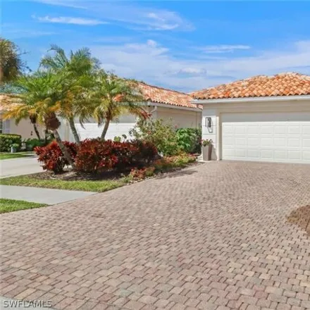Buy this 2 bed house on Village Walk Circle in Collier County, FL 34109