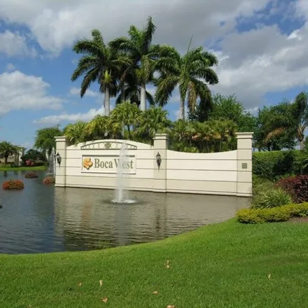 Buy this 2 bed townhouse on 2342 Bridgewood Drive in Boca West, Palm Beach County