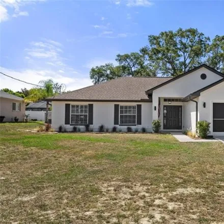 Buy this 4 bed house on 5056 Harbinger Road in Spring Hill, FL 34608