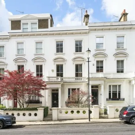 Buy this 4 bed townhouse on 33 Campden Hill Road in London, W8 7RU