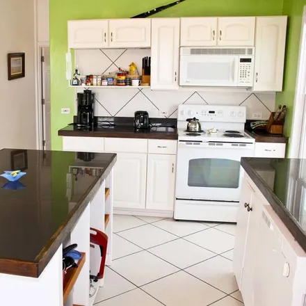 Rent this 4 bed townhouse on Wemyss in Long Island, Bahamas