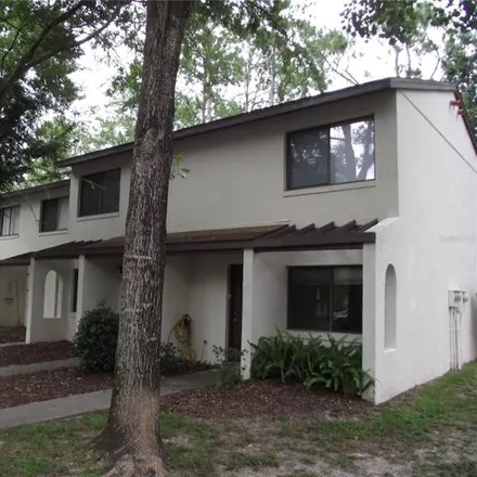 Rent this 2 bed townhouse on Southwest 25th Terrace in Gainesville, FL 32608