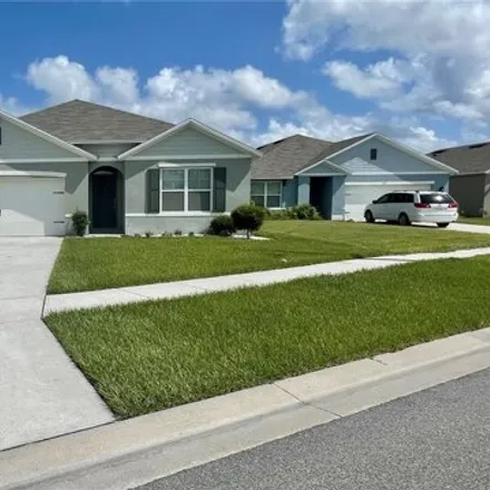 Buy this 4 bed house on Alexzander Way in Polk County, FL 33881