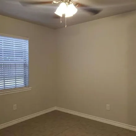 Rent this 2 bed apartment on 1516 East Avenue in Katy, TX 77493