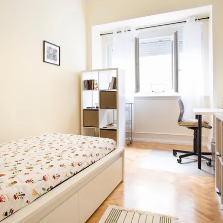 Rent this 4 bed room on Rua Carlos Mardel 46 in 1900-183 Lisbon, Portugal