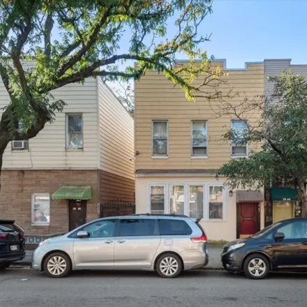 Buy this 5 bed duplex on 39-42 58th St in Woodside, New York