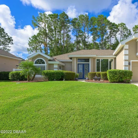 Buy this 4 bed house on 30 Raleigh Drive in Palm Coast, FL 32164