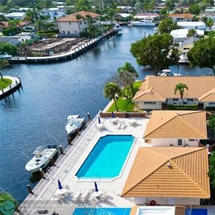 Rent this 2 bed condo on 2812 Northeast 28th Avenue in Country Club Isles, Pompano Beach