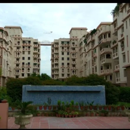 Buy this 4 bed apartment on meghdootam pond with fountains. in Barola Byepass, Noida City Centre
