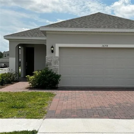 Rent this 4 bed house on Swan Swim Drive in Polk County, FL 33836