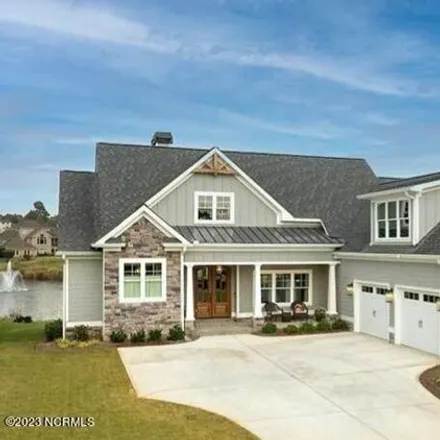 Buy this 4 bed house on 306 Autumn Pheasant Loop Northwest in Brunswick County, NC 28467