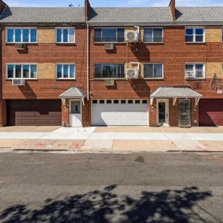 Buy this 8 bed house on 2247 Harman Street in New York, NY 11385