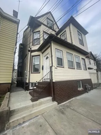 Buy this 5 bed house on 462 East 23rd Street in Paterson, NJ 07514