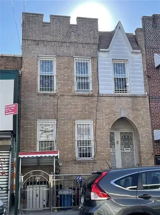 Buy this 5 bed townhouse on 1372 West 7th Street in New York, NY 11204