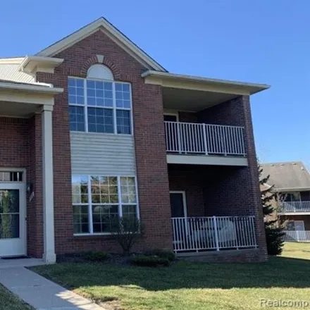 Rent this 2 bed condo on 1889 Flagstone Circle in Rochester, MI 48307