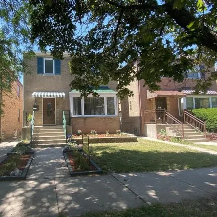 Buy this 4 bed house on 6022 North Central Park Avenue in Chicago, IL 60659