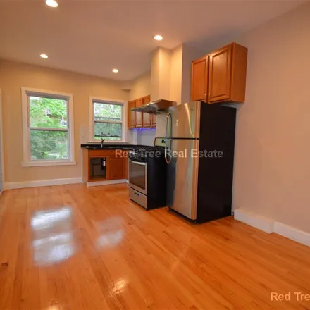 Rent this 3 bed condo on 66 Hyde Park Avenue