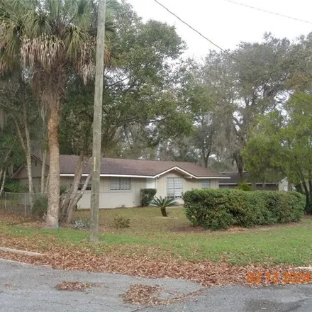 Rent this 4 bed house on 740 South Thompson Street in DeLand, FL 32720