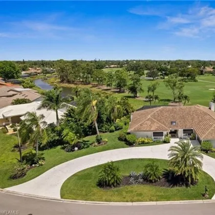 Buy this 4 bed house on 1921 Imperial Golf Course Boulevard in Collier County, FL 34110