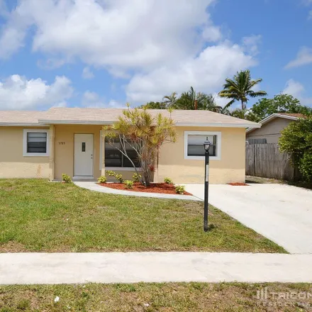 Buy this 4 bed house on 5801 Barbados Way West in Gramercy Park, Palm Beach County