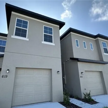 Buy this 4 bed townhouse on 632 Lake Shore Parkway in Polk County, FL 33896