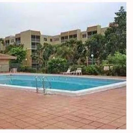 Rent this 2 bed condo on Northwest 75th Place in Country Club, Miami-Dade County