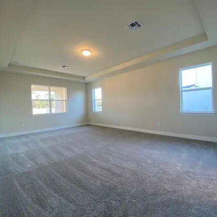 Rent this 4 bed apartment on Weatherly Way in Orange County, FL 32766