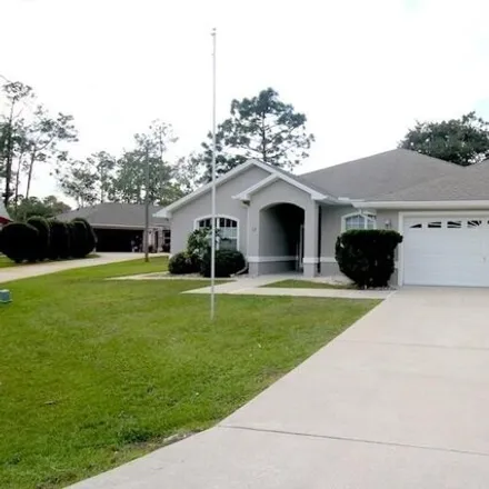 Rent this 5 bed house on 98 Walla Place in Palm Coast, FL 32164