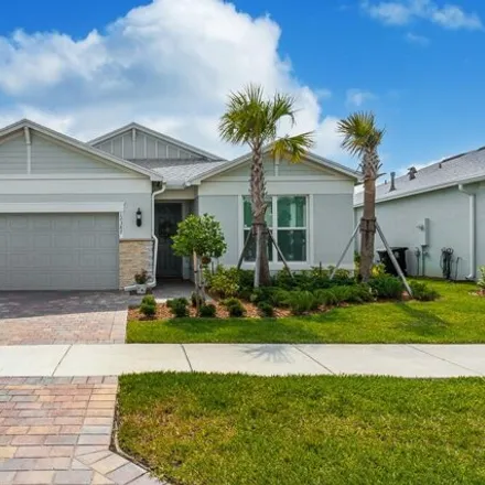 Rent this 3 bed house on Southwest Sand Dollar Way in Port Saint Lucie, FL 34853
