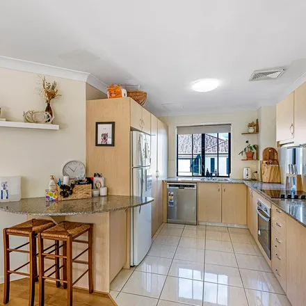 Rent this 4 bed townhouse on 45 Hillridge Crescent in Varsity Lakes QLD 4227, Australia