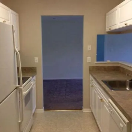 Rent this 2 bed apartment on Silvercreek Boulevard in Oakland Charter Township, MI 48306